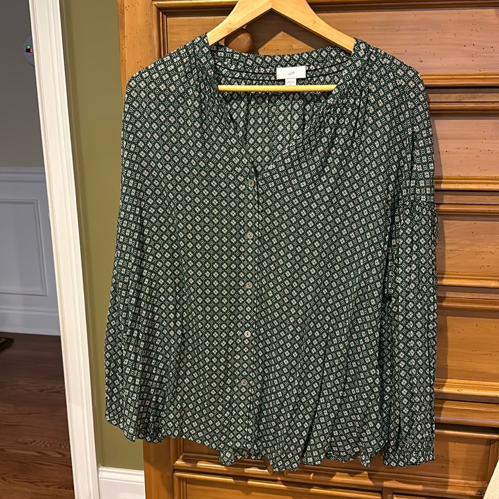 Green with a geometric floral all over design